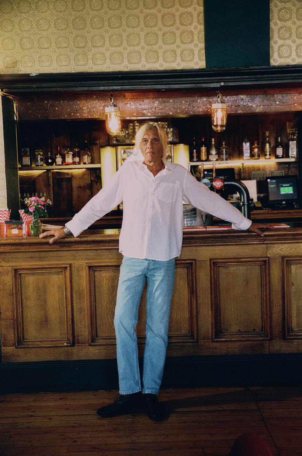 Styling inspiration: Eddy men's white patch pocket shirt in sustainable cotton bamboo, relaxed fit, made in London by Saywood. Worn with lightwash denim.