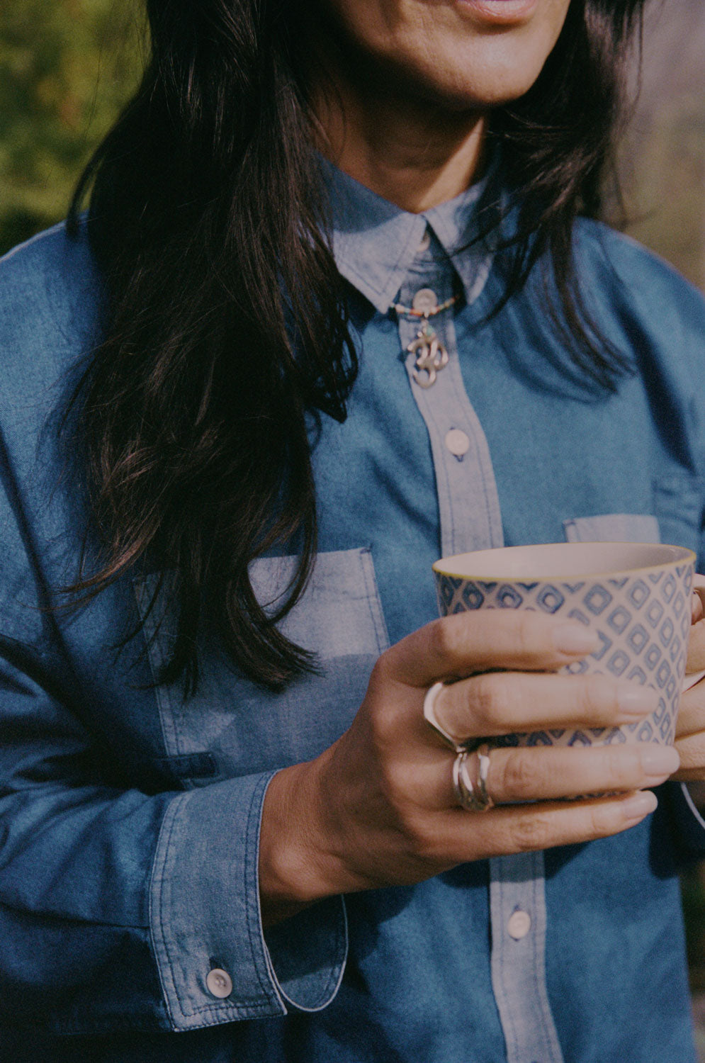 Close-up of Lela Shirt contrast patchwork pocket in pale blue and indigo Japanese denim