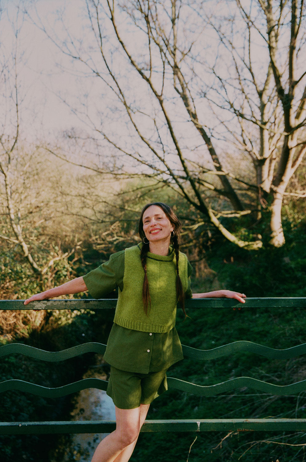 Layering inspiration: Frances olive green Cuban shirt styled with Bessie shorts and Ada lambswool sweater vest, made in London by Saywood