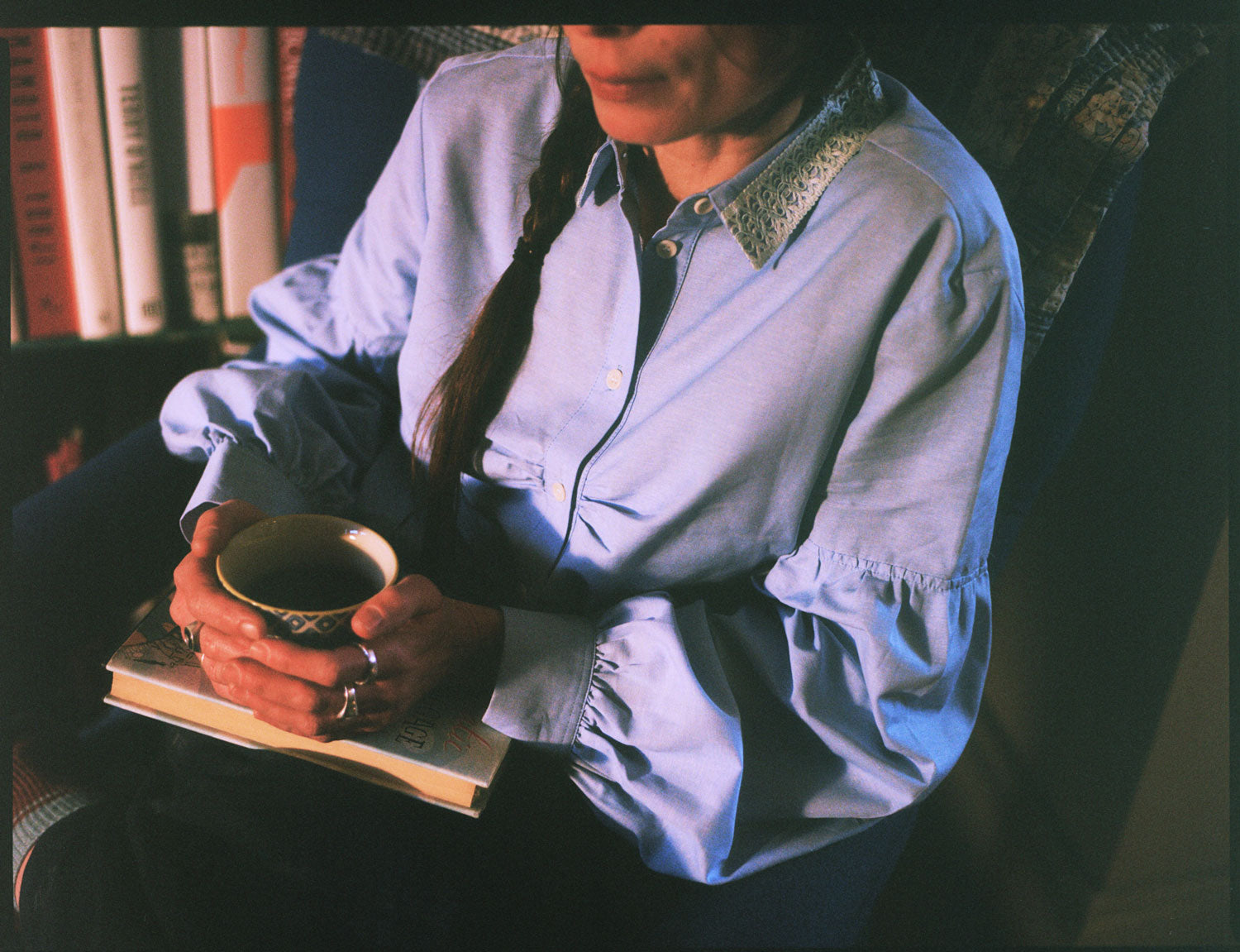 Close-up of Edi pale blue shirt showing gathered bust detail and lace collar